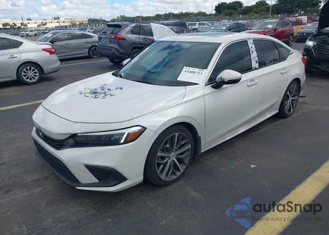 2023 Honda Civic Touring z USA, uszkodzony, nr VIN 2HGFE1F90PH324323